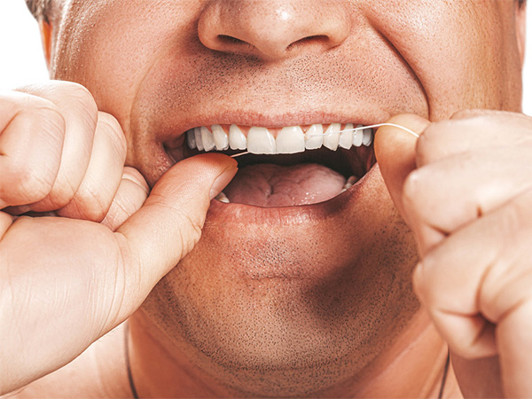 The Ultimate Guide to Flossing for a Healthy, Dazzling Smile