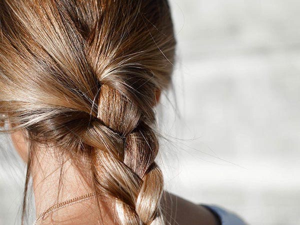Common Causes of Hair Breakage and How to Prevent Damaged, Weak Hair